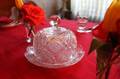 CUT CRYSTAL LIDDED CHEESE PLATE AND MICHAEL ARAM SERVEWARE