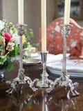 SET OF FOUR RENAISSANCE STYLE CANDLESTICKS