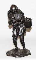 198 PATINATED BRONZE FIGURE OF A FARMER