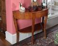PAIR OF CARVED SIDE CHAIRS AND AN ANTIQUE DEMILUNE