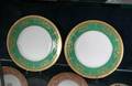 ASSORTED SETS OF GREEN AND GILT DINNERWARE