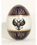 AN IMPERIAL RUSSIAN HANDPAINTED PORCELAIN EASTER EGG PERIOD OF EMPEROR ALEXANDER III 18811894