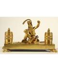 A GILT BRONZE INK STAND 19TH CENTURY with seated officer in uniform proffering a drink from his flask