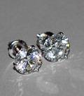 210 PAIR OF DIAMOND STUDS