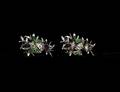 518 EIGHTEEN KARAT WHITE GOLD DIAMOND AND EMERALD BRO