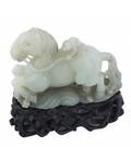 A CHINESE PALE CELADON JADE MONKEY AND HORSE GROUP