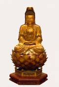 151 GOOD CARVED AND GILTWOOD FIGURE OF BUDDHA