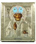 A RUSSIAN ICON OF SAINT NICHOLAS THE MIRACLEWORKER IN A GILTSILVER OKLAD 19081926