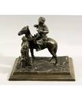 AN ANTIQUE RUSSIAN BRONZE OF A COSSACK AND A WOMAN bronze with medium brown patina