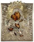 A RUSSIAN ICON OF THE VLADIMIRSKAYA MOTHER OF GOD UMILENIE IN A GILT SILVER OKLAD ST PETERSBURG 1841