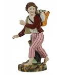 A RARE PORCELAIN FIGURE OF A BOY CARRYING AN EGG BASKET POPOV PORCELAIN FACTORY 1860S