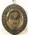 A SMALL GESSO MEDALLION WITH BUST OF JESUS IN TONDO