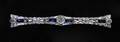 253 FOURTEEN KARAT GOLD DIAMOND AND SAPPHIRE BAR PIN