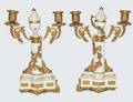 557 PAIR OF BISQUE TWO LIGHT CANDELABRA