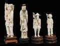 569 GROUP OF FOUR CARVED IVORY FIGURES