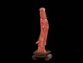 37 CARVED CORAL FIGURE OF GUANYIN