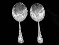 34 TWO STERLING SILVER SERVING SPOONS