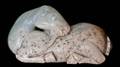 60 CARVED JADE FIGURE OF A RECUMBENT HORSE