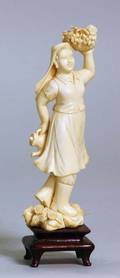 34 CARVED IVORY FIGURE OF A GIRL