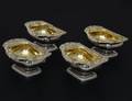 64 SET OF FOUR GEORGE III STERLING SILVER SALTS