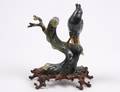 81 CARVED SERPENTINE JADE FIGURE OF A BIRD