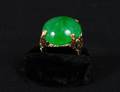 154 FOURTEEN KARAT GOLD AND JADE RING