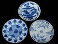 122 THREE BLUE AND WHITE PORCELAIN PLATES