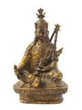 A Tibetan Gilt Bronze Figure of a Deity