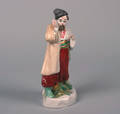 A Russian Porcelain Figure of a Gentleman
