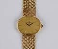 113 VINTAGE BAUME  MERCIER EIGHTEEN KARAT GOLD WRISTW