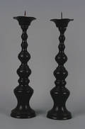 A Pair of Patinated Bronze Pricket Sticks