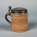 A German Silver Lidded Ceramic Tankard