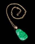 An 18 Karat Gold Diamond and Jadeite Pendant
