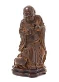 A Carved Bamboo Figure of an Immortal