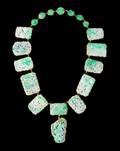 An 18 Karat Gold and Jadeite Necklace