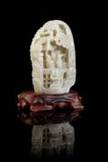 A Carved White Jade Boulder
