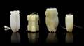 Four Carved Jade Pendants