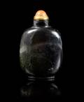 A Black Jade Snuff Bottle