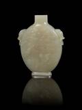 A Carved Jade Snuff Bottle