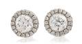 A Pair of 14 Karat White Gold and Diamond Studs