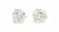 A Pair of White Gold and Diamond Stud Earrings