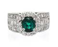 An 18 Karat White Gold Blue Tourmaline and Diamond Ring