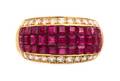 An 18 Karat Yellow Gold Invisibly Set Ruby and Diamond Ring