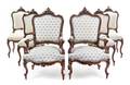 A Louis XV Style Parcel Gilt Walnut Salon Suite