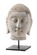 A Carved Stone Head of Buddha