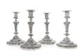 A Set of Four English SilverPlate Candlesticks