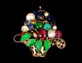 208 FOURTEEN KARAT GOLD BASKET BROOCH