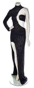 A Black and Metallic Single Shoulder Evening Gown