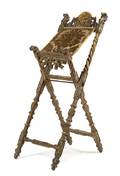 An Italian Baroque Painted and Parcel Gilt Book Stand