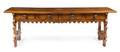 A Renaissance Revival Walnut Trestle Table